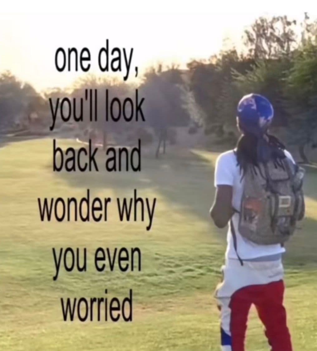 A person walking across a field with the words one day, you'll look back and wonder why you ever worried.